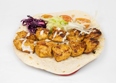 Jonaldo’s grilled chicken kebab with salad and a creamy sauce in Kirkcaldy.